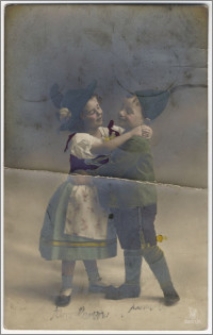 [Dziewczynka i chłopiec w strojach ludowych]